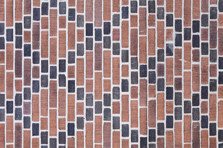 Red brick wall background texture close up