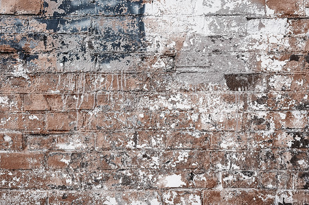 Old brown brick wall background texture close upの写真素材