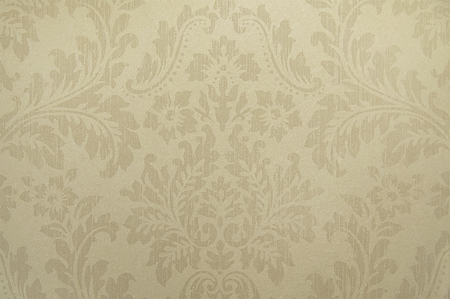 Old beige wallpaper background texture close upの写真素材