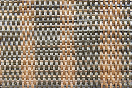 Brown and orange decorative mat background texture close upの写真素材