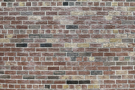 Old red brick wall background texture close up
