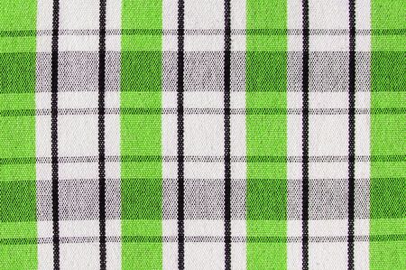 Striped black and green fabric background texture close upの写真素材