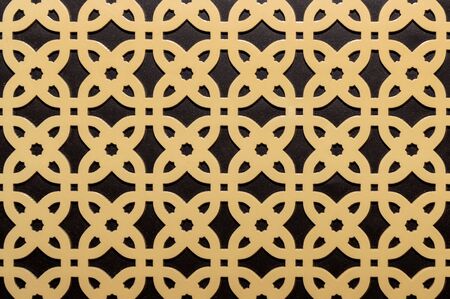Metal decorative pattern on the wall background close up