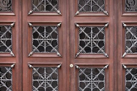 Brown wooden door background texture close upの写真素材