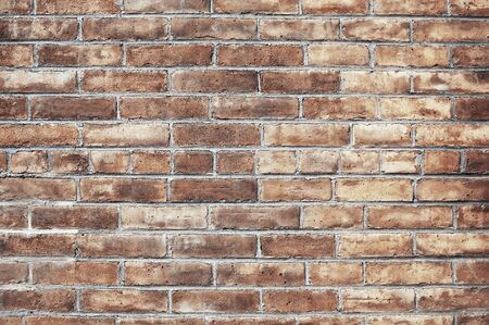 Old red brick wall background texture close upの写真素材