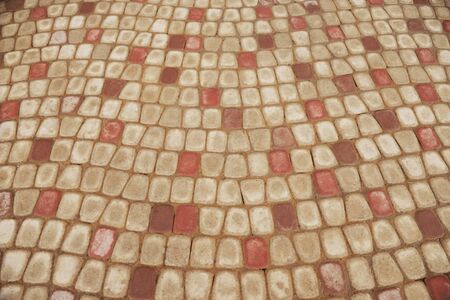 Mosaic granite pavement background texture close up