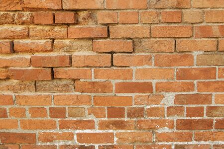 Old red brick wall background texture close upの写真素材
