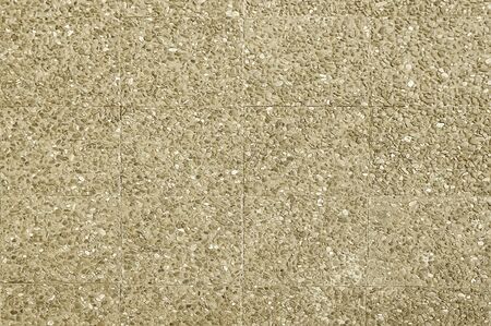 Old beige stone pavement background texture close upの写真素材