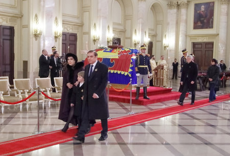 Bucharest, Romania - December 13, 2017: Paul Lambrino (D), also known as Prince Paul of Romania, with his son Carol Ferdinand (C) and wife Lia (S) leave after paying their respects in front of the coffin with the remnants of King Michael I of Romania is iのeditorial素材