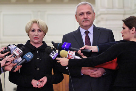 Bucharest, Romania - January 17, 2018: Vasilica Viorica Dancila (L), the new Prime Minister of Romania and the Social Democrat leader, Liviu Dragnea (R), speak in a press conference at the Chamber of Deputies in Bucharest, January 17 2018.のeditorial素材