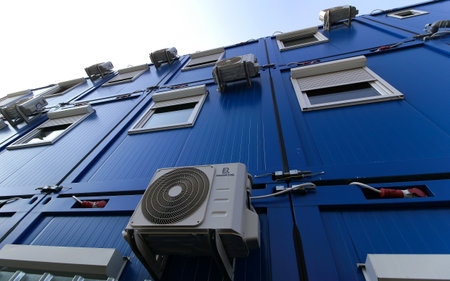Bucharest, Romania - October 17, 2018: Several air conditioners are mounted on the wall of a building in Bucharest. This image is for editorial use only.のeditorial素材