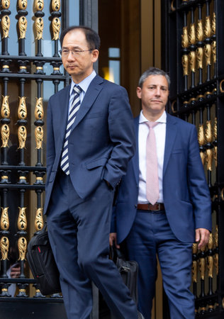 Bucharest, Romania - June 07, 2019: Jaewoo Lee, head of the International Monetary Fund mission for Romania and Bulgaria and Alejandro Hajdenberg, leave after a press conference held in Bucharest.のeditorial素材