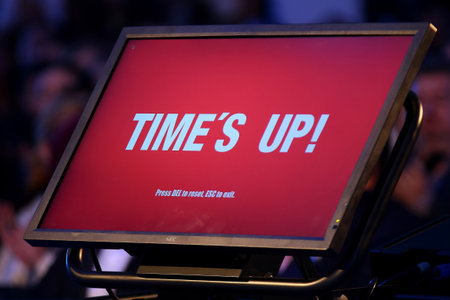 Bucharest, Romania - April 14, 2019: A confidence monitor on which is written Time's up stays on a stage.のeditorial素材