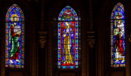 Bucharest, Romania - April 14, 2019: Roman Catholics believers attend at celebration of Palm Sunday at Saint Joseph Cathedral, in Bucharest.のeditorial素材