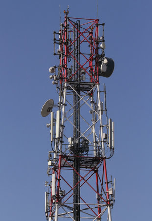 Bucharest, Romania - March 17, 2019: A pole with telecommunication antennas as seen near Vodafone headquarters, in Bucharest. This image is for editorial use only.のeditorial素材