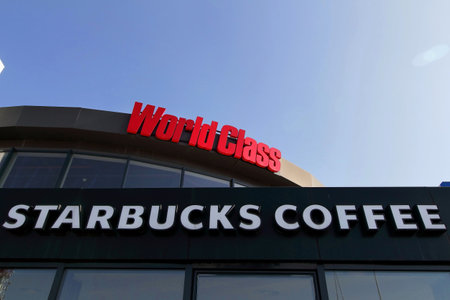 Bucharest, Romania - October 17, 2018: The signs of World Class fitness and Starbucks Coffee are present on a mall in Bucharest, Romania. This image is for editorial use only.のeditorial素材