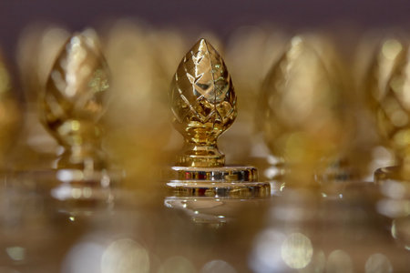 Bucharest, Romania - March 25, 2019: More golden trophies usually used to award sports competitions.のeditorial素材