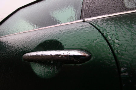 Bucharest, Romania -  January 24, 2019: A Mini car is glazed with ice after an winter ice storm, in Bucharest, Romania.のeditorial素材