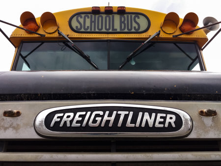 Bucharest, Romania - September 26, 2019: A classic American school bus from Thomas Built Buses on Freightliner FS-65 chassis is parked in Bucharest.のeditorial素材