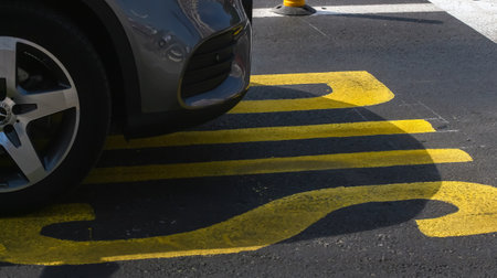 Bucharest, Romania - September 19, 2019: A car is driven unauthorized on a bus lane in Unirii Square in Bucharest, Romania. This image is for editorial use only.のeditorial素材
