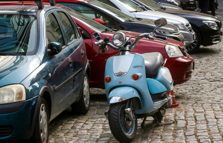 Bucharest, Romania - November 07, 2019: An Aprilia Habana Custom scooter is seen in front of several cars parked on a street in Bucharest.のeditorial素材