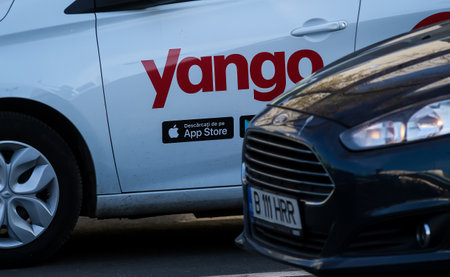 Bucharest, Romania - December 09, 2019: A car with the Yango logo of the multinational Yandex.Taxi BV belonging to Russian multinational corporation Yandex N.V. is seen on a street in Bucharest.のeditorial素材