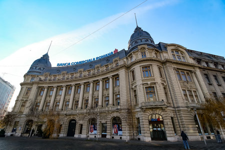 Bucharest, Romania - December 19, 2019: The Oscar Maugsch Palace, Romanian Commercial Bank headquarters, a historical monument built in 1906, was sold to Project Regina Elisabeta Bucharest SRL.のeditorial素材