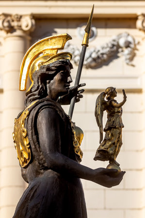 Bucharest, Romania - November 05, 2019: The statue of the goddess Minerva, made by sculptor Mihai Ecobici, is seen in front of The Romanian Academy, in Bucharest This image is for editorial use only.のeditorial素材