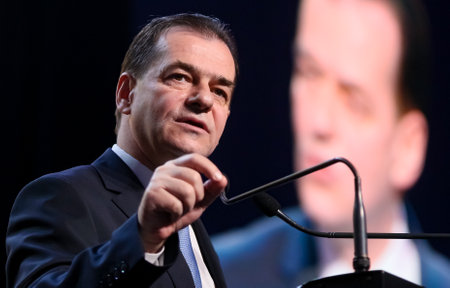 Bucharest, Romania - February 02, 2020: Ludovic Orban, Romanian prime minister and president of the National Liberal Party, speaks at the National Convention of the National Liberal Party, in Bucharest.のeditorial素材