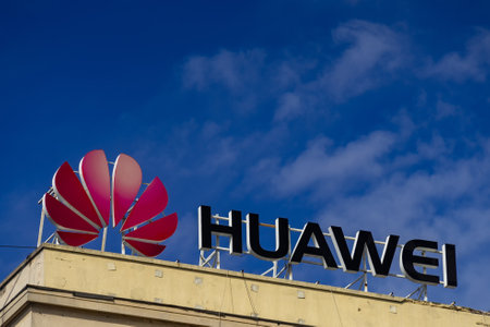 Bucharest, Romania -  March 17, 2020: A logo of Huawei, Chinese telecommunications equipment company, is displayed on the top of a building, in Bucharest, Romania.のeditorial素材