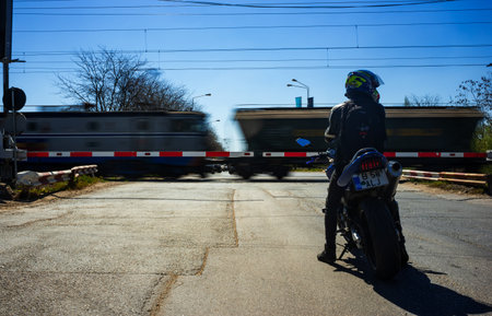 Bucharest, Romania - April 08, 2020: Railway barrier between the capital Bucharest and the city of Voluntari in Romania.のeditorial素材