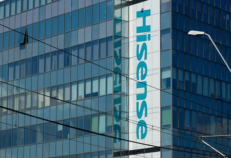 Bucharest, Romania - April 23, 2020: The logo of Chinese multinational appliance and electronics manufacturer Hisense is seen on its headquarter building, in Bucharest.のeditorial素材