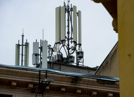 Bucharest, Romania - May 15, 2020: Many GSM telecommunications antennas are installed on top of a building in Bucharest. This image is for editorial use only.のeditorial素材