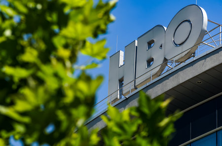 Bucharest, Romania -  June 28, 2020: A logo of HBO, American premium cable and satellite television network owned by AT&T's WarnerMedia, is displayed on the top of a building, in Bucharest, Romania.のeditorial素材