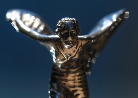Bucharest, Romania - June 28, 2020: A Spirit of Ecstasy statuette is seen on the hood of a Rolls Royce luxury car, on top of the radiator cover. This image is for editorial use only.のeditorial素材