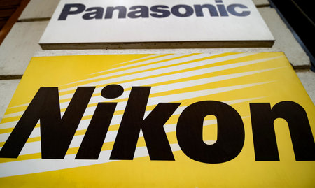 Bucharest, Romania - June 22, 2020: The Nikon logo of the Japanese corporation known for the production of digital cameras, and lenses,  is seen on the wall of a store in downtown Bucharest.のeditorial素材