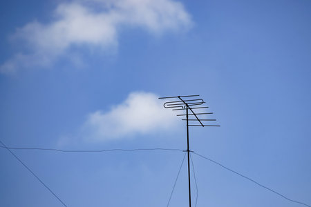 Bucharest, Romania - July 19, 2021: An old antenna is mounted on the top of a building in Bucharest.のeditorial素材