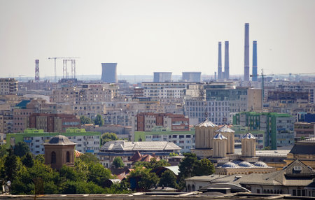 Bucharest, Romania - September 09, 2021: The chimneys of the CET Sud power plant, as seen from 6 km away from the center of Bucharestのeditorial素材