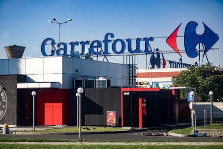 Bucharest, Romania - September 27, 2021: The logo of the French multinational retailer Carrefour is seen above its shop located in the Vulcan Value Centre in Bucharest.のeditorial素材