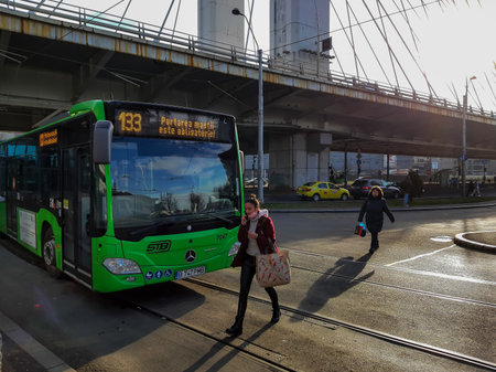 Bucharest, Romania - December 24, 2021: A public transport bus Mercedes Citaro Hybrid is stopped at the end station below Basarab Overpass in Bucharest.のeditorial素材