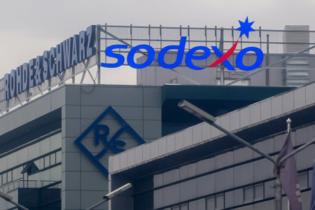 Bucharest, Romania - January 12, 2022: The logo of French food services and facilities management company Sodexo is seen on the top of a building, in Bucharest, Romania.のeditorial素材