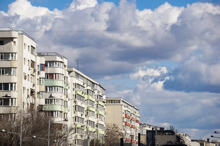 Bucharest, Romania - February 18, 2022: Cloudy sky above some large blocks of flats in Bucharest.のeditorial素材