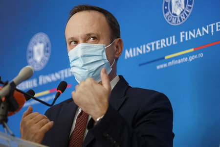 Bucharest, Romania - February 11, 2022: Adrian Caciu, Romanian Minister of Public Finance, holds a press conference at the ministry's headquarters.のeditorial素材