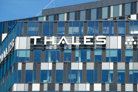 Bucharest, Romania - May 20, 2022: The logo of French multinational company Thales is seen on the top of the Orhideea Towers building, in Bucharest, Romania.のeditorial素材