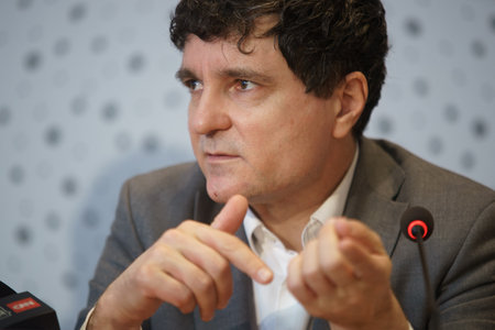 Bucharest, Romania - December 09, 2022: Nicusor Dan, the Mayor of Bucharest, speak to the press after the signing a non-refundable European funds contract for waste management in sector 6.のeditorial素材