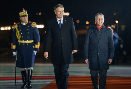 Bucharest, Romania - December 12, 2022: Romanian President Klaus Iohannis (L) welcoming the Switzerland President Ignazio Cassis (R) at the Cotroceni Palace.のeditorial素材