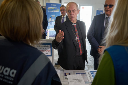 Bucharest, Romania. 14th Mar, 2023: Justin Welby (C) Archbishop of Canterbury visit UNHCR integrated center for Ukrainian refugees due to the Russian invasion of Ukraine.のeditorial素材