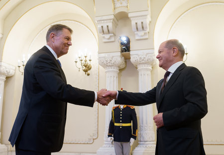 Bucharest, Romania. 3rd Apr, 2023: Romanian President, Klaus Iohannis (L), shakes hans with Olaf Scholz (L), Chancellor of Germany, at the beginning of the Romania-Germany-Moldova trilateral meeting at Cotroceni Palace, in Bucharest, Romania.のeditorial素材