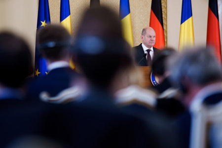 Bucharest, Romania. 3rd Apr, 2023: Olaf Scholz, Chancellor of Germany, listen to the speech of Romanian President, during the joint statements at Cotroceni Palace, in Bucharest, Romania.のeditorial素材
