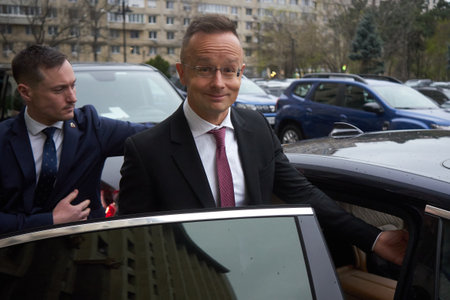 Bucharest, Romania. 4th Apr, 2023: Peter Szijjarto, The Minister of Foreign Affairs and Foreign Trade of Hungary, leaves after the signing ceremony of the agreement between the Government of Romania and the Government of Hungary regarding the establishmenのeditorial素材